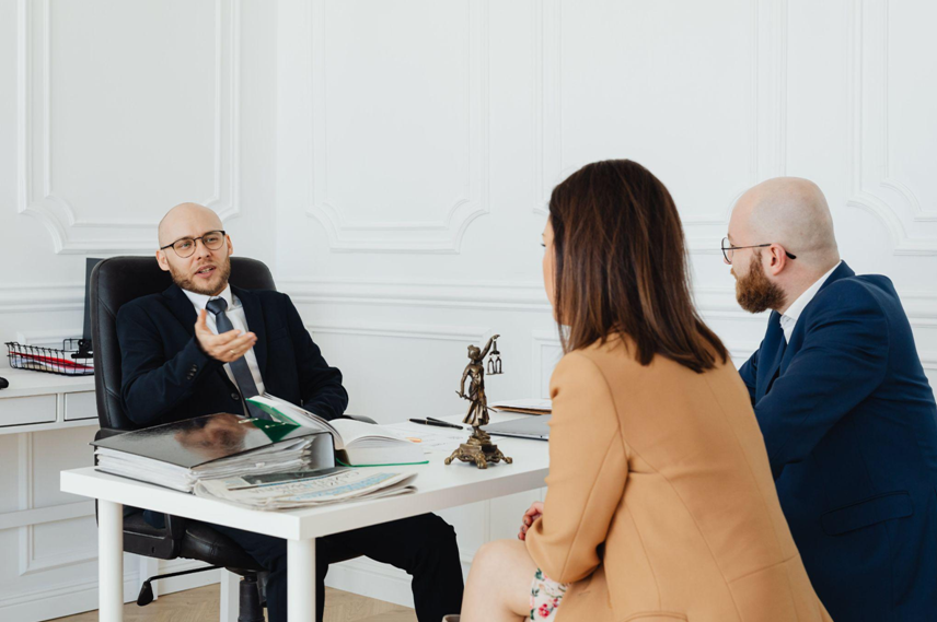 Choosing the Right Accident Lawyer: Tips for Finding the Best Representation accident lawyer explaining the process to a couple in his office
